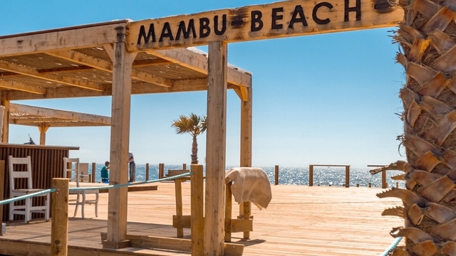 Mambu Restaurant Beach Club Logo