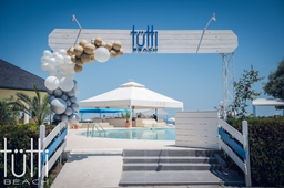 Tutti Beach Restaurant & Beach Club Logo